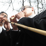 Two young boys playing different kind of launeddas