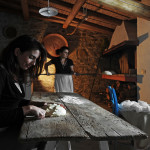 mother and daughter making bread