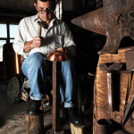coppersmith Luigi Pitzalis working in his own workshop