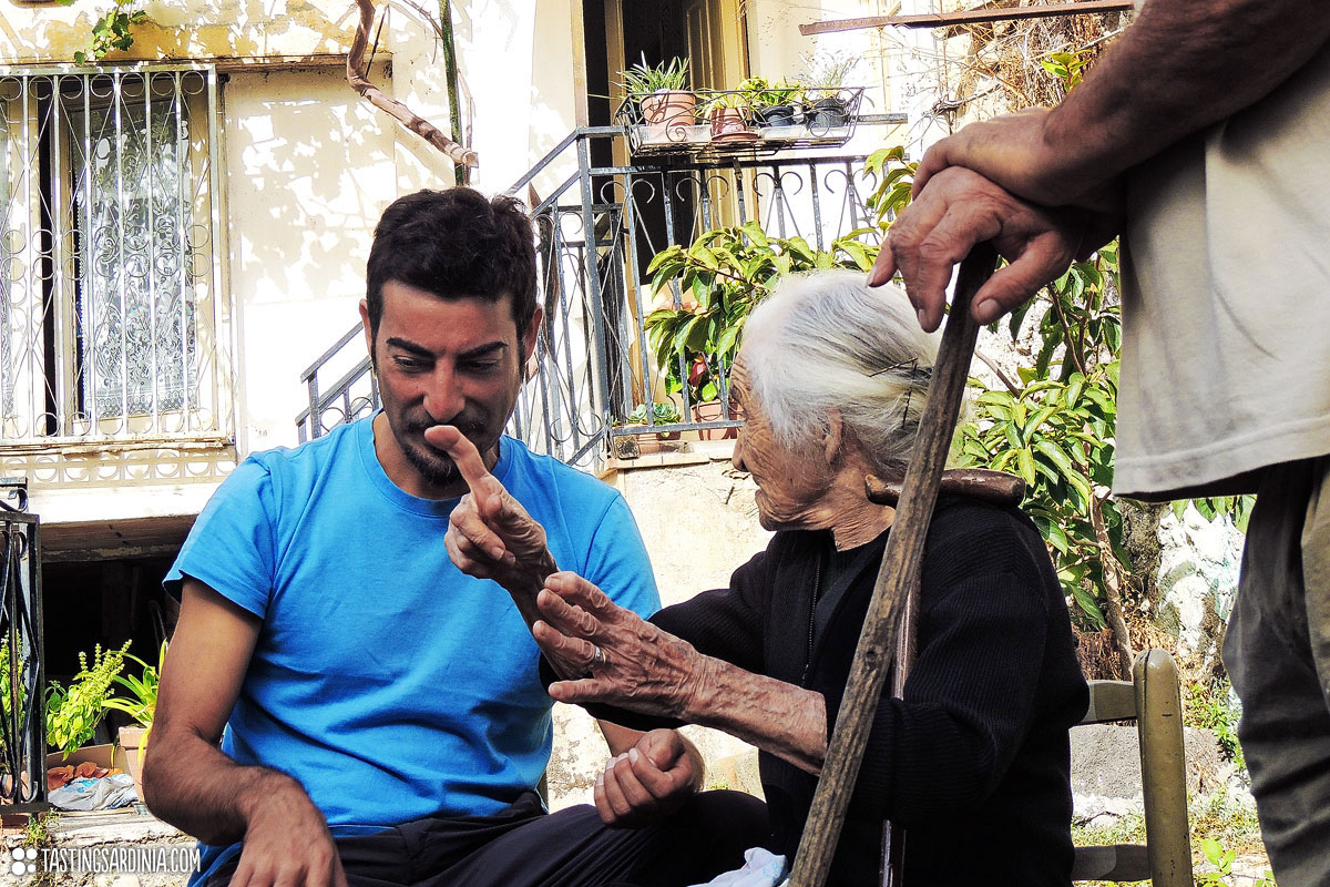 Our local insider talking with a centenarian lady speaking about longevity