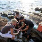 our local insider Ivo and some learners cleaning fish in Sarchittu during fish soup cooking lesson