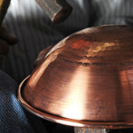 a specific manufacturing technique lie in punding with an hammer over a laminated copper