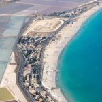 The long Poetto beach and salina